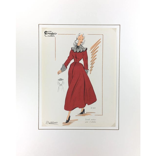 Vintage French fashion sketch of a woman modeling a red astrakhan coat with trim. Color lithograph signed lower left,...