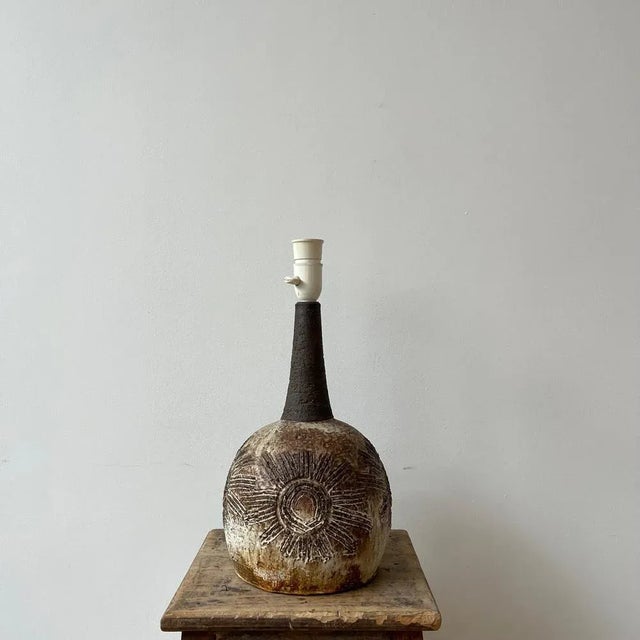 An artist made ceramic table lamp. Denmark, c1960s. Signed to the underside. Unusual unique finish. Since re-wired and PAT...