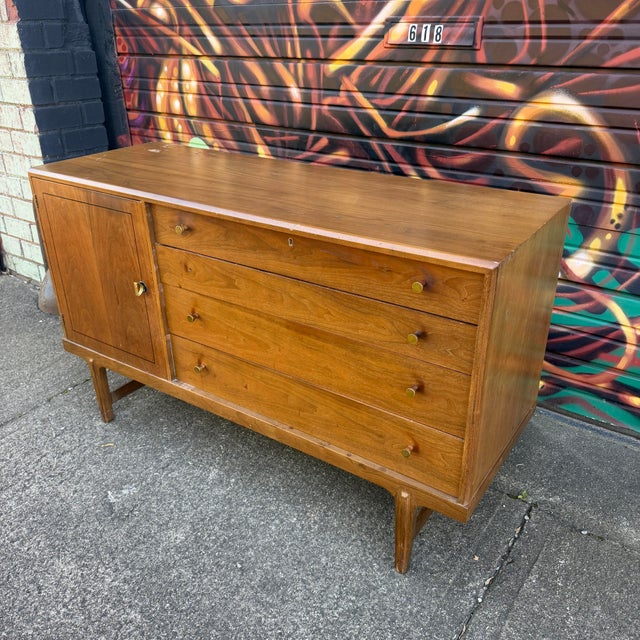This is a unique Drexel dresser from their Apart Mates collection. It features 4 long drawers on the right side and 4...