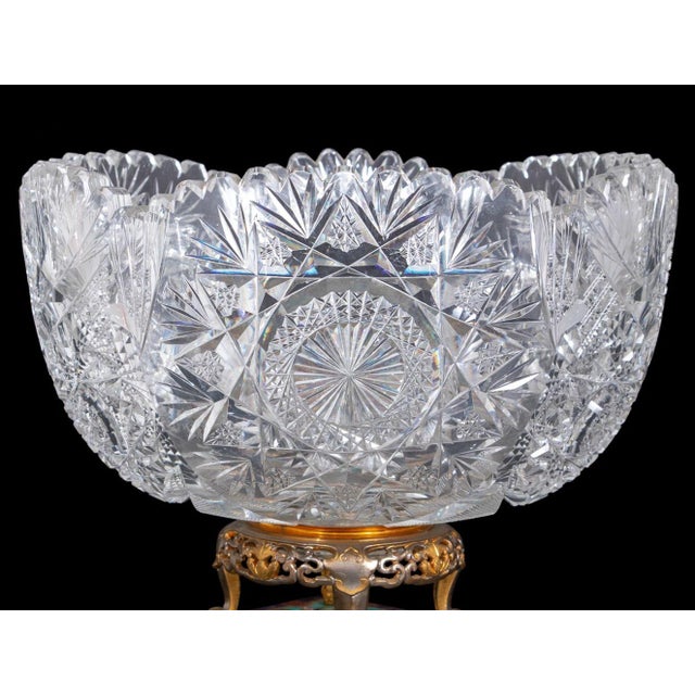 French Enameled Gilt Metal and Cut Glass Centerpiece, late 19th century, the scalloped cut glass bowl mounted on a pierced...