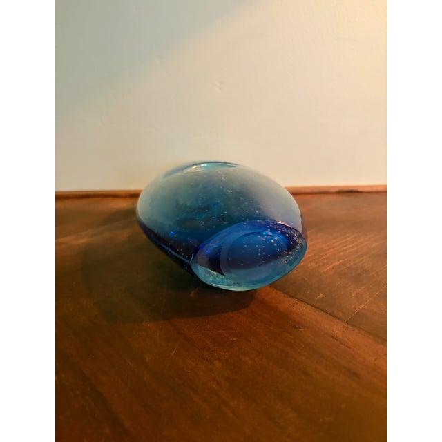 Beautiful vintage handblown art glass vase featuring an organic, free-form silhouette in luminous shades of aqua and...