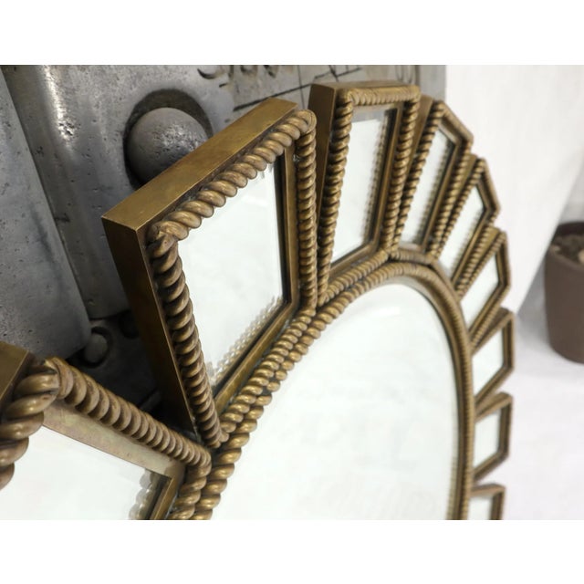 Mid-Century Modern heavy bronze sunburst wall mirror by Labarge.