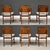 A set of six mid century modern Danish style dining chairs with burl backs and walnut frames made by Herritage. Unmarked....