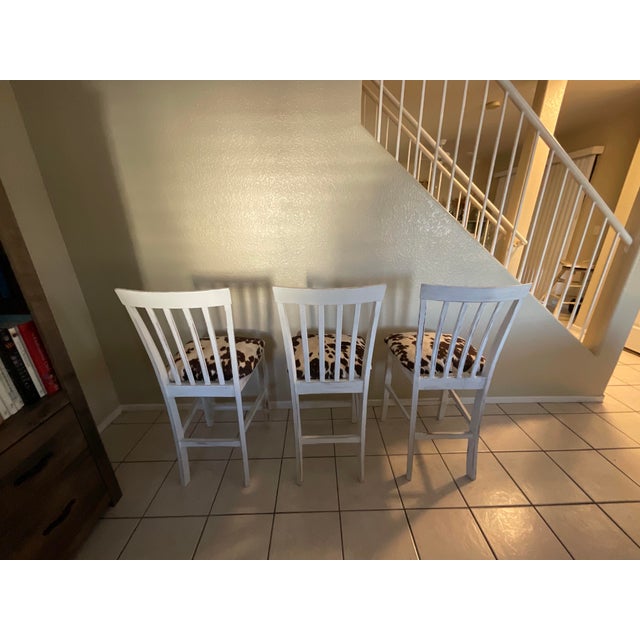 2000 - 2009 Rustic Farmhouse Whitewash Bar Stools W/ Cowhide Upholstered Seats Set of 3 For Sale - Image 5 of 12
