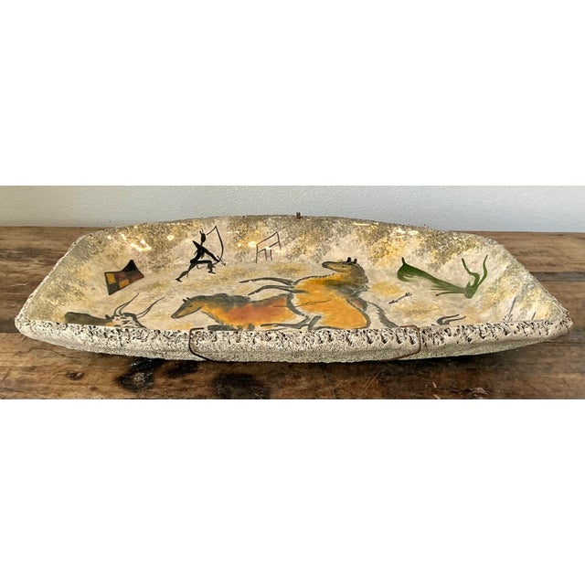 This striking mid-century modern ceramic bowl is a masterful homage to the prehistoric cave paintings of Lascaux. Hand-...