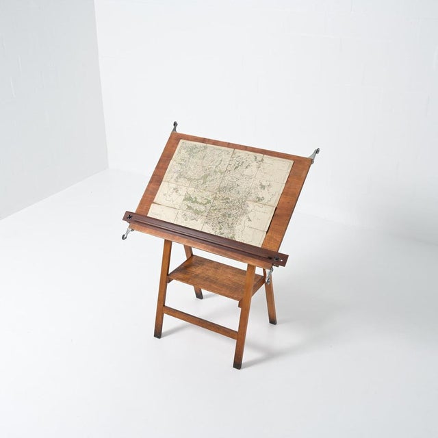 We date this wonderful industrial drafting table back to the 1930/1940s This elegant table consists of a wooden frame and...