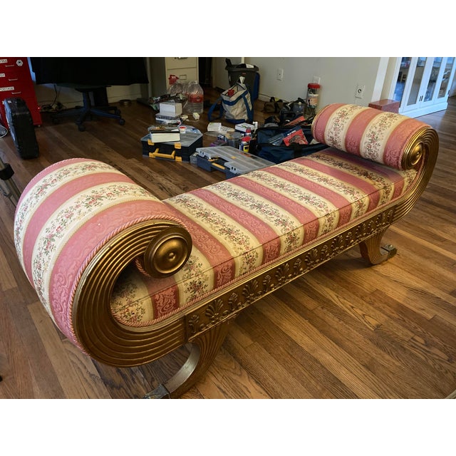 Gorgeous settee! It is backless, and the gold frame has well-designed swirls and floral carvings—heavy claw metal feet. I...