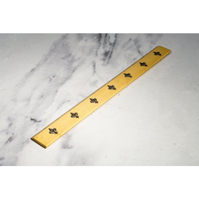 A handsome and wonderfully tactile Victorian-era desk ruler, this distinctive piece combines practical function with the...