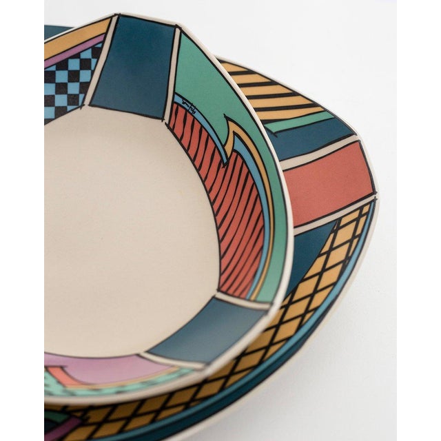 The design of the plates were created by Dorothy Hefner under the name FLASH. They are made of porcelain, and their...