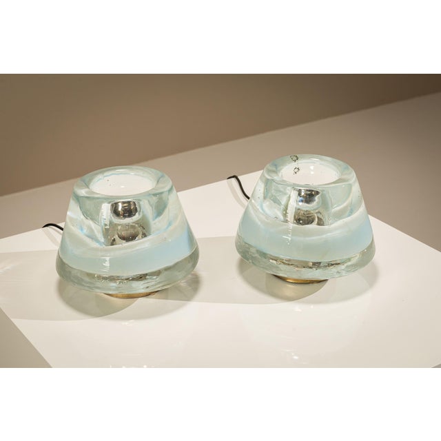 Leucos produced Murano glass lighting in Italy during the post-war decades, and the present pair fits that context through...