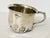 A sterling silver child's cup (often referred to as a christening cup or baby mug) featuring these exact hallmarks is a...
