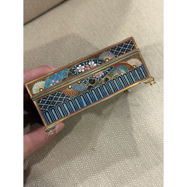 An exceptional Japanese cloisonne enamel trinket box, attributed to the celebrated Inaba workshop, dating to the Meiji...