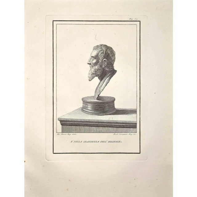 Profile of ancient roman bust, form the series "antiquities of herculaneum", is an original etching on paper realized by...