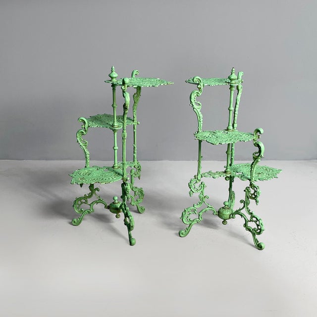 Italian Art Deco plant stand tables in green cast iron, 1930s Pair of green-painted cast iron plant stands or tables. The...