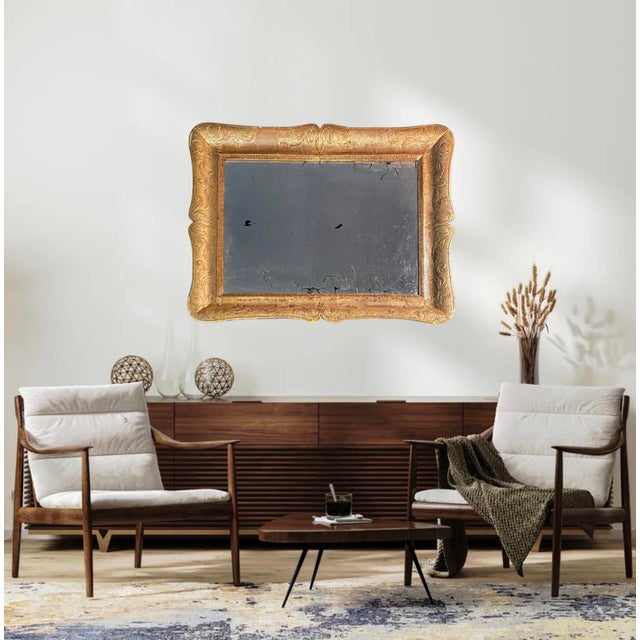 19th Century Italian Giltwood Empire Mirror-Frame A beautiful and significant Italian mirror frame in the ‘guantiera’...