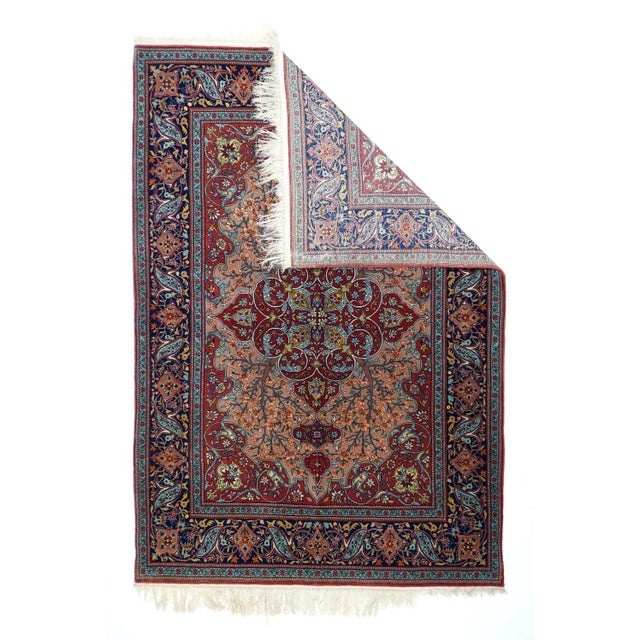 With a composuite wool and silk pile, this very finely woven Turkish medallion scatter woven near Istanbul, shows a red,...