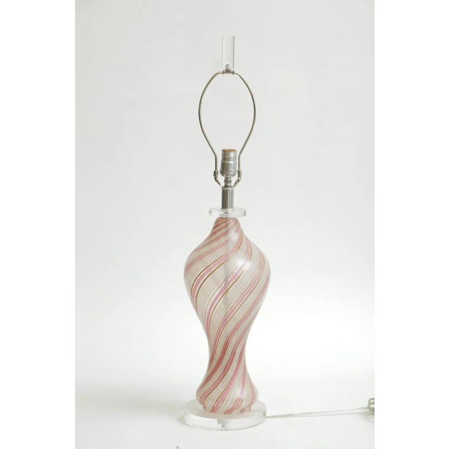 This wonderful vintage Italian Murano striped swirled glass lamp is in the style of Dino Martens. It is from the 60's. The...