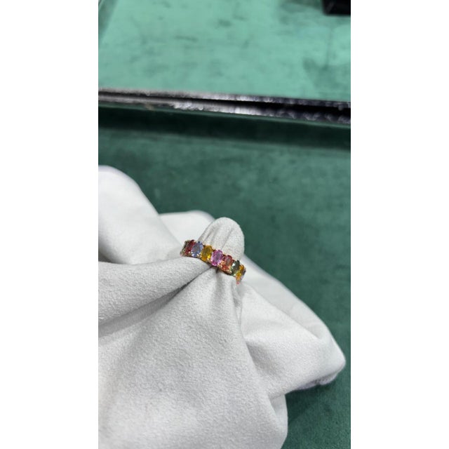 GEMSTONE DETAILS Gold Purity: 18K Solid Gold MULTI SAPPHIRE: 1.10 CTS 18K GOLD NET WEIGHT: 6.90 GRAMS GROSS WEIGHT: 7.12...
