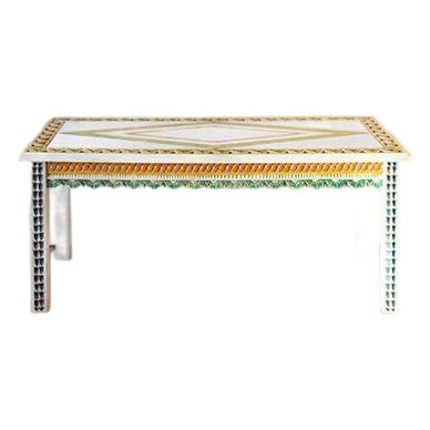 Add a dash of whimsy to your home with this cheerful hand carved and painted coffee table. Its playful carvings, scalloped...