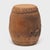 This terracotta garden stool from the early 20th century honors tradition with its simple, drum-form shape. A pattern of...