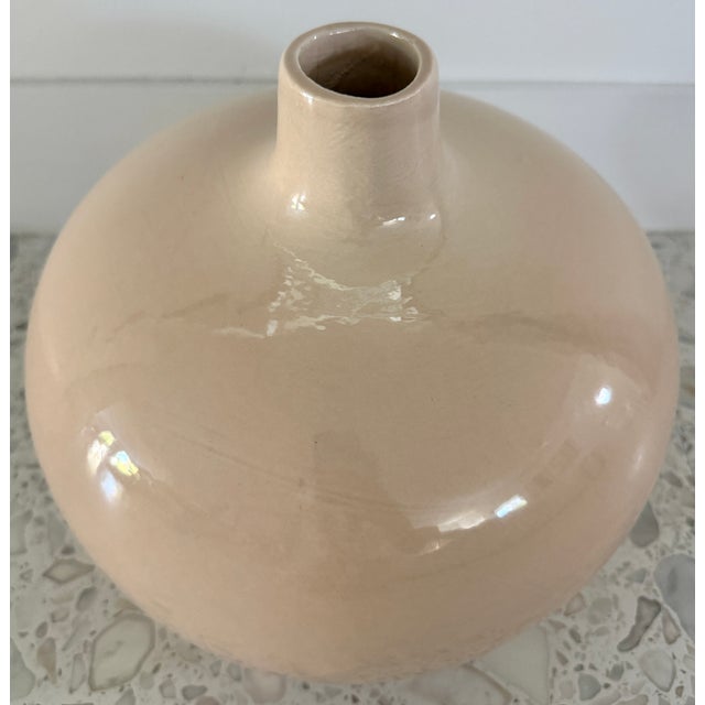 Large Mid-Century Modern ceramic vase in a beige finish from 80's. High-gloss glazed ceramic. It features a classic...