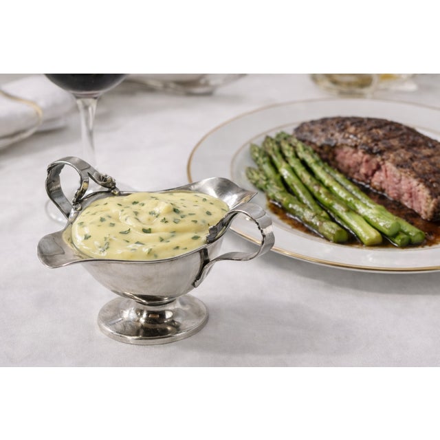 A handsome vintage silver plated mint sauce boat by Daniel & Arter of England, known for producing high quality silver and...