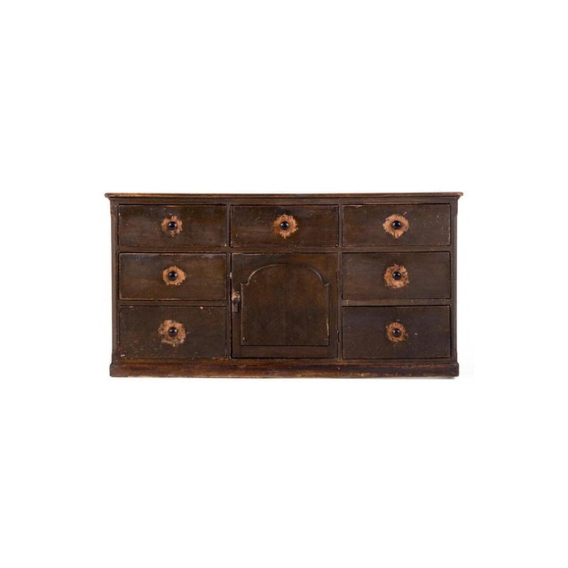 A wonderful early victorian pine dresser in the original paint with superb wear around the handles of the drawers. The...
