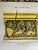 This print depicts a portion of stained glass in a church from Normandy, France. It was created by the artist Nicolas...