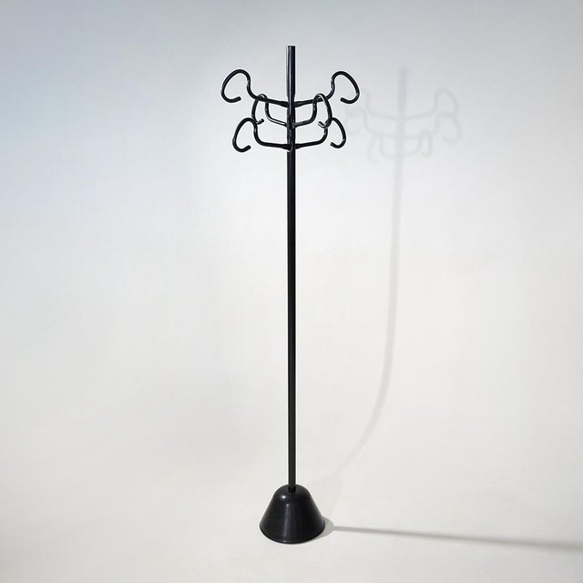 A “Servomanto” coat stand designed by Achille Castiglioni for Zanotta in the 1980s, characterised by a vertical black-...