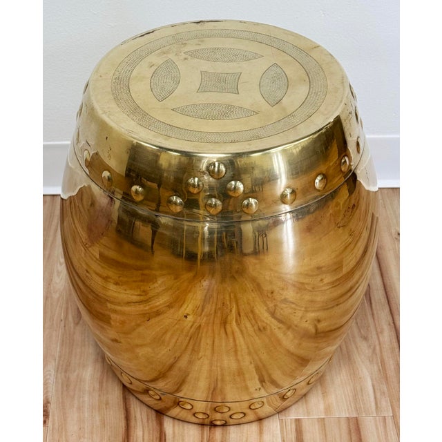 Vintage solid brass Asian motif garden drum stool. Features etched Asian symbol detail to top and rivet details to sides....