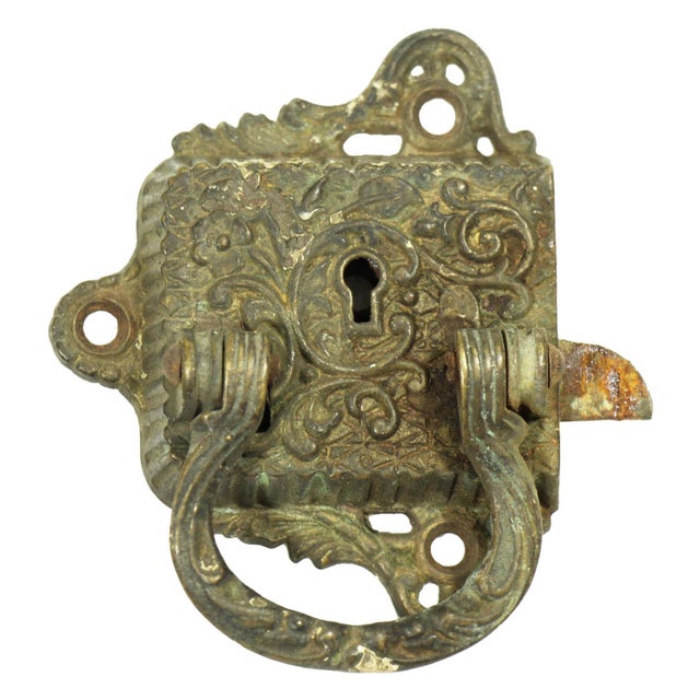 This antique left swing Victorian bronze ice box latch. The original mounting screws are not available. No key is...