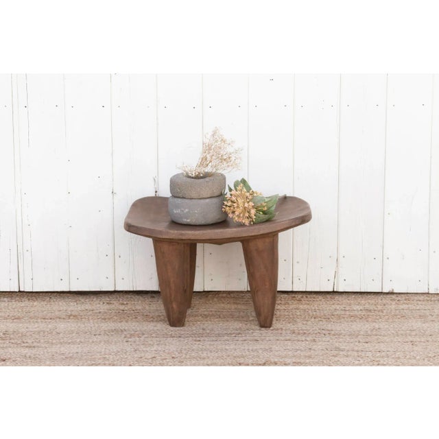 Senufo stools and side tables are traditionally made by the Senufo people, who live in West Africa. This primitive stool...