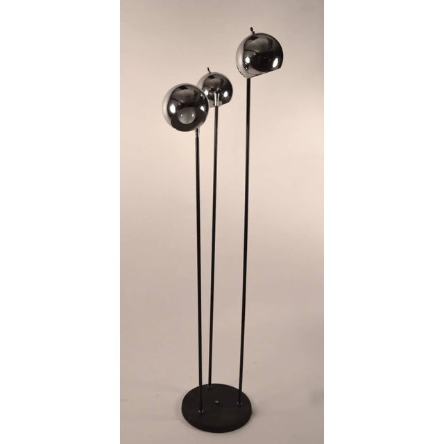 Three light ball top floor lamp, each ball fixture will adjust in position to direct the light, and each has its own...