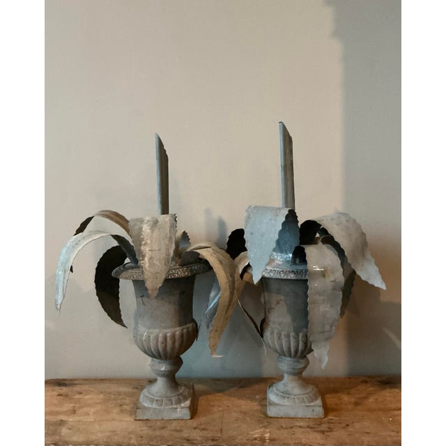 Presenting a captivating pair of vintage Boho zinc agave plants nestled within classic urns, offering a distinctive blend...