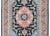 A beautiful vintage Persian Heriz rug woven with a central floral medallion amidst a field of more bold stylized flowers,...