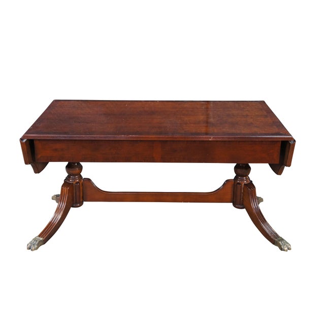 Vintage Bombay Company mahogany Duncan Phyfe style drop leaf coffee table console. Unsigned Dimensions: 40" x 21" x 19.5",...