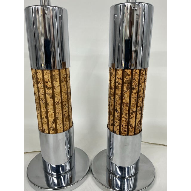 Great pair of 1970s vintage stylish cylindrical cork and polished chrome table lamps.