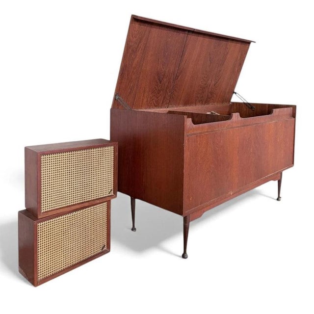 The mid century radiogram by Armstrong is a rare vintage record player that combines an integrated record player and...