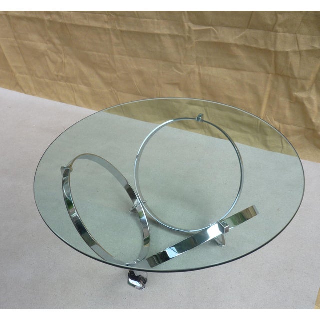 CIRCLES coffee table designed by Knut Hesterberg. This model is made of chromed steel and consists of three interlocking...