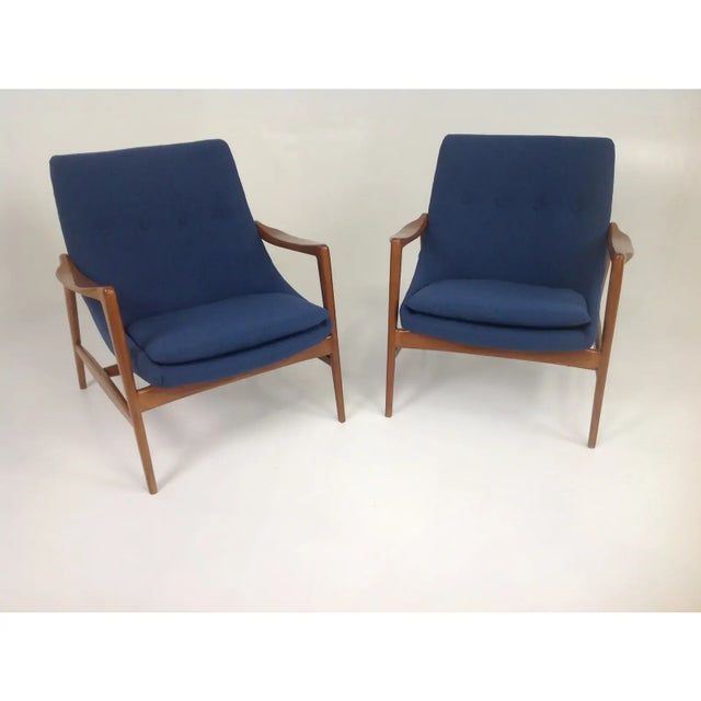 Mid-Century Modern lounge chairs in the style of Ib Kofod-Larsen. Stunning lounge chairs; Mid-century style at its finest!...
