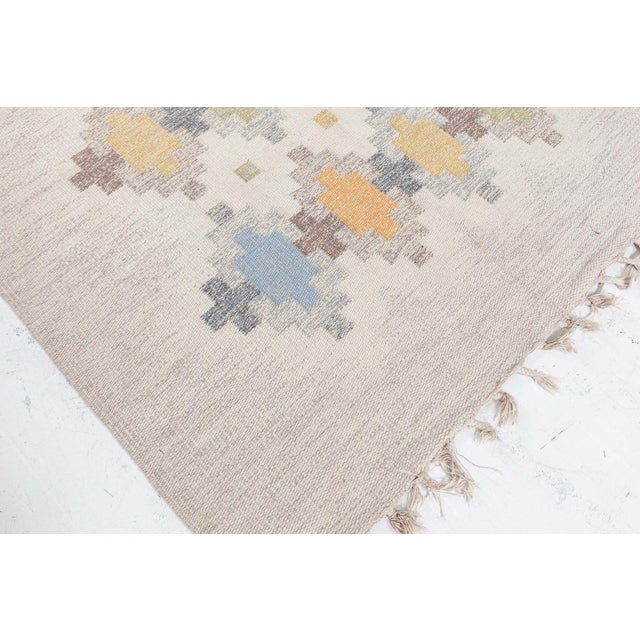 Vintage Swedish Flat Weave Rug by Erik Lundberg Size: 4'8" × 6'9" (142 × 205 cm) Color: Beige, Blue, Gray, Green, Yellow A...