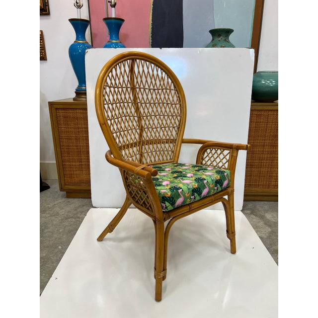 Available for your consideration: Coastal Peacock rattan arm chair. Seat was recently replace with a whimsical tropical...