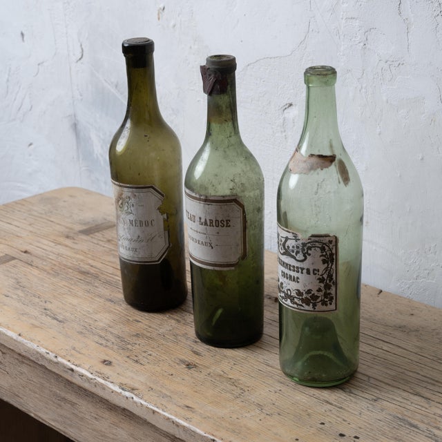 St. Julien Medoc, Chateau Larose and Hennessey Cognac bottles, early 20th century. Deaccessioned from the historic Owen-...