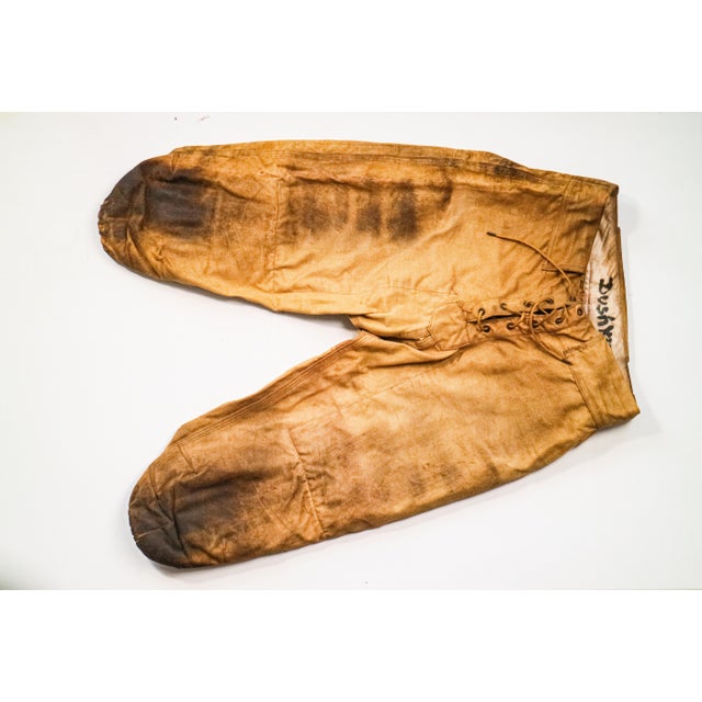 These amazing antique youth football pants are a remarkable piece of sports team memorabilia from the 1930s. Crafted from...