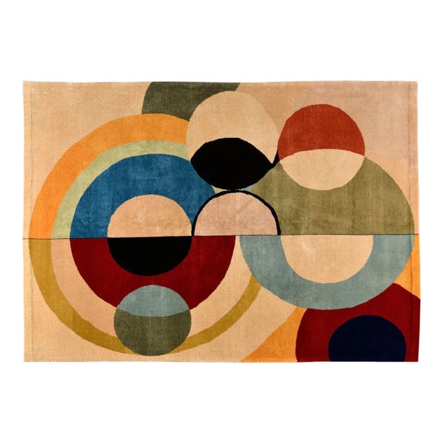 Hand-knotted in wool on a cotton foundation, this 6x9 vintage French rug draws inspiration from the pioneering work of...