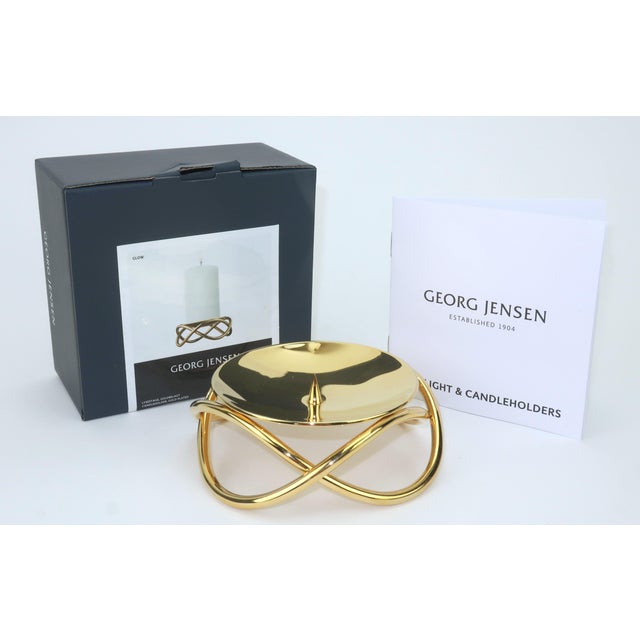 Classic modern gold plated candle holder designed by Maria Berntsen for the iconic Scandinavian metalsmith brand, Georg...