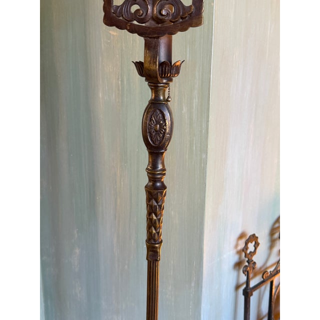 Striking pair of tall, wrought iron 1920's Spanish Revival/ Gothic Revival torchieres attributed to Oscar Bach in original...