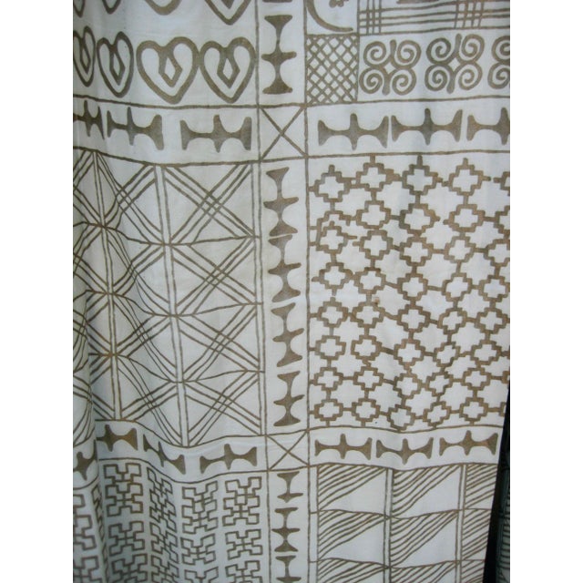 Two pairs available . This pair of vintage Fortuny curtains are done out of the Ashanti design in gold and Ivory coloring...