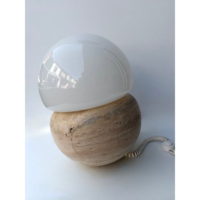 Mid-Century Modern Space Age Pair of abstract sculpture Culbuto table or bedside lamps in travertine and white opaline...
