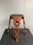 French artisanal octagonal plant stand in laminated hardwoods with decorative inlay detail. Constructed from contrasting...